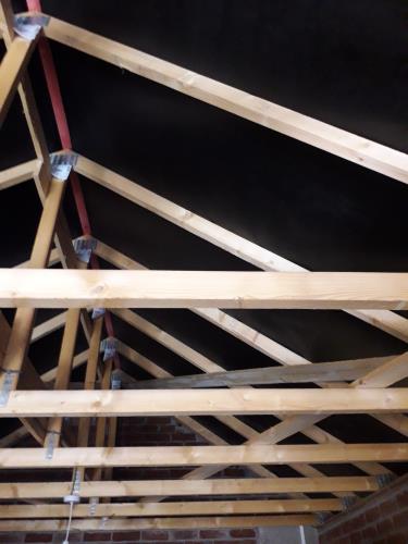 The timber structure supporting a garage/office roof for a gabel roof.